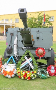 Wreaths are laid all around the 25-pounder gun of the Cape Field Artillery Saluting Troop